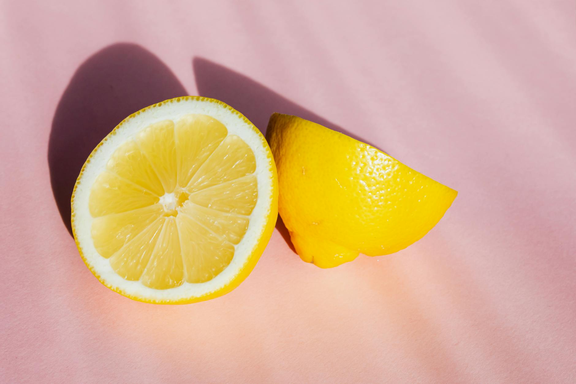 Fresh lemons in soft sunlight, symbolizing renewal and gentle pleasure